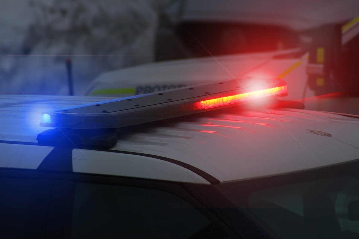 Red and blue emergency lights on a police vehicle